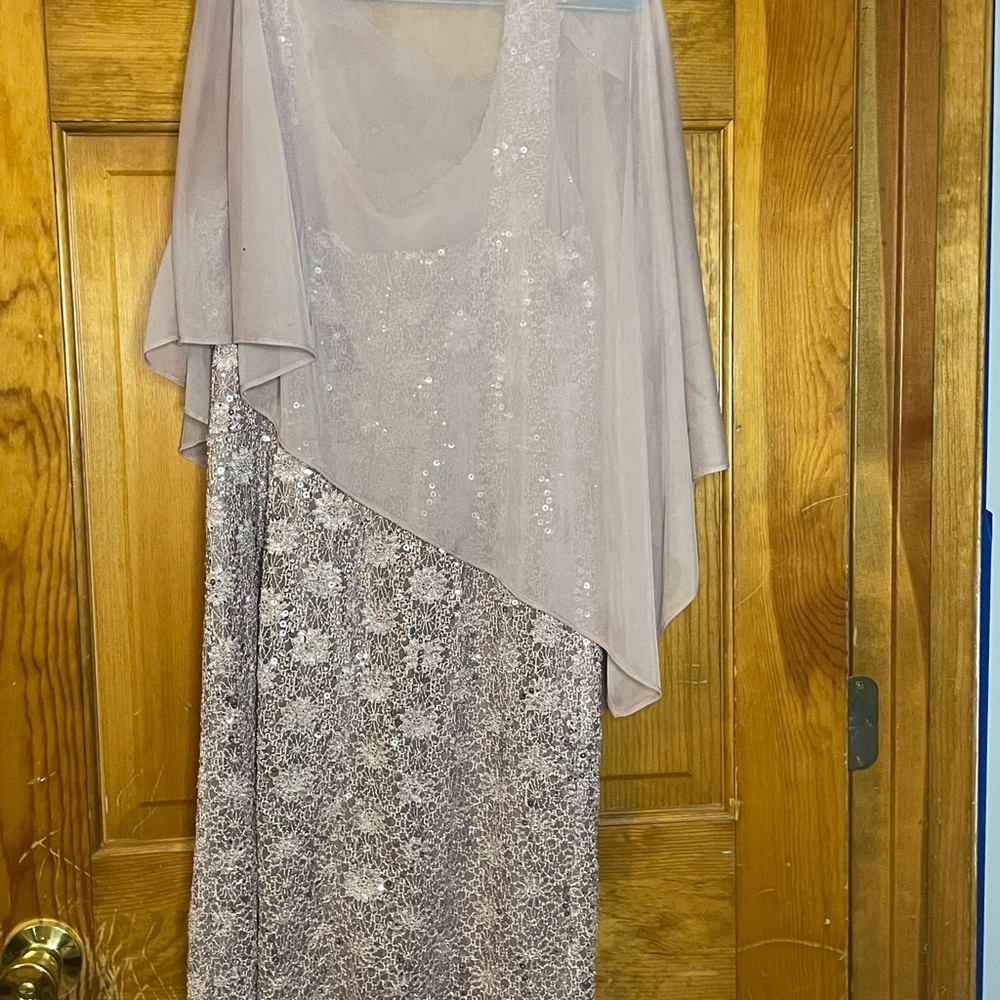 Beautifully sequined dress with sheer overlay